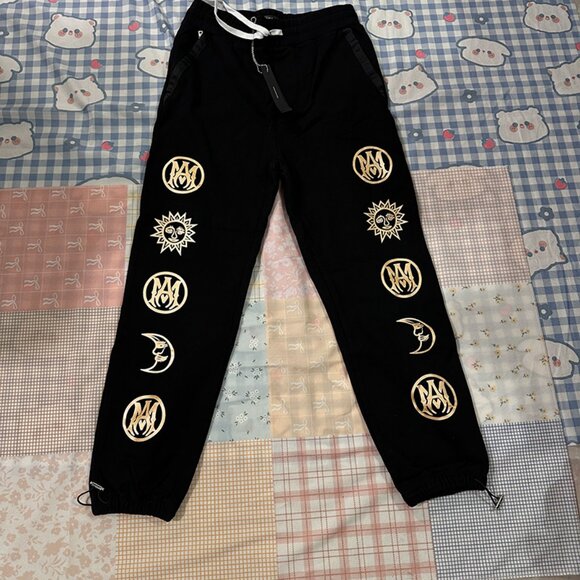 Amiri Black And Gold Patterned Casual Pants - Picture 1 of 6